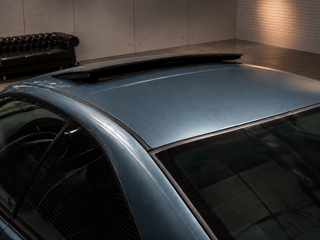 BMW E31 Schiebedach und grün getöntes Glas